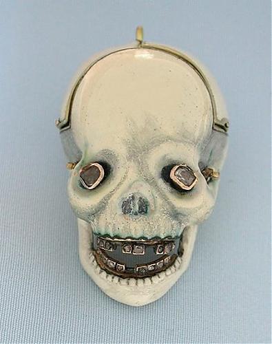 4339160_skull_clock_001.jpg‏